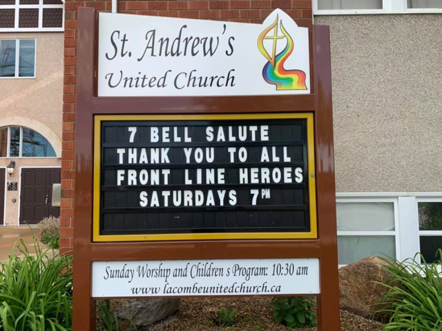 Members of St. Andrew’s United Church in Lacombe, Alberta, ring their church bell weekly to honour frontline workers. Sign at St. Andrew's United Church supporting frontline workers