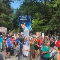 A crowd marches in support of the community of Grassy Narrows 