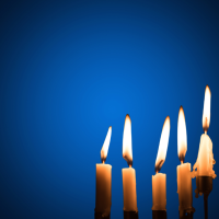 Candles burning with a blue background