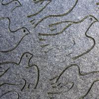 A drawing of doves in flight