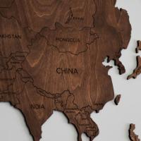 A wooden decorative map of Asia